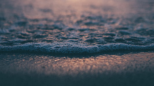 shallow focus photography of body of water thumbnail