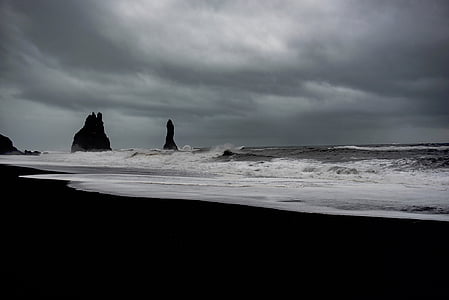 sea waves crashing at shore during cloudy skies thumbnail