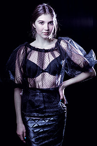 woman wearing black midi dress thumbnail