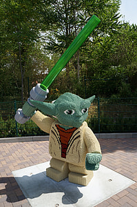 Yoda holding lightsaber statue thumbnail