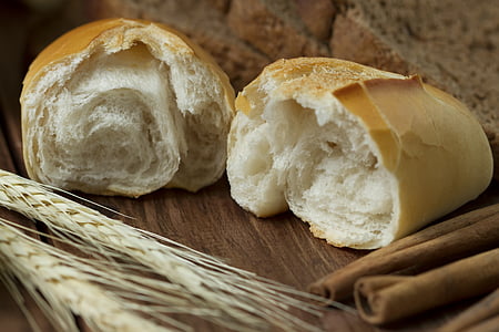 bread on brown wooden surface thumbnail