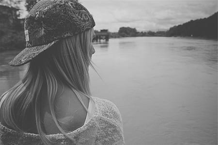 woman wearing white top with cap thumbnail