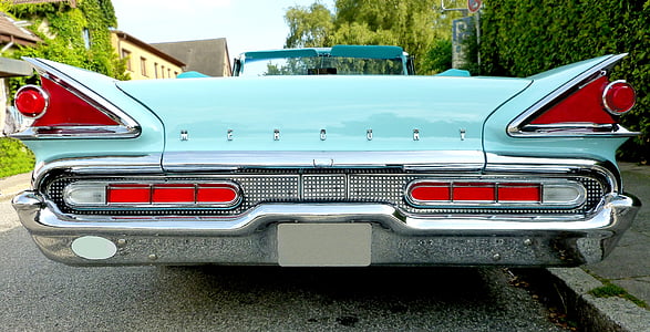 closeup photo of blue muscle car thumbnail