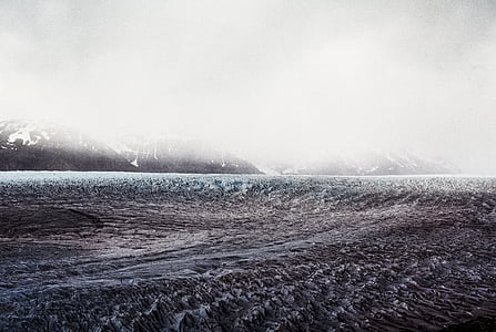 rocky mountain surrounded with fogs thumbnail