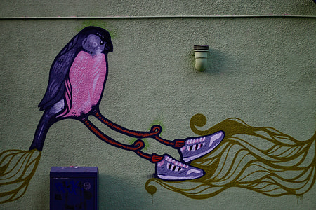 purple and pink bird decor mounted on wall thumbnail