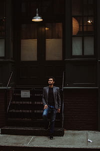 man standing looking up thumbnail