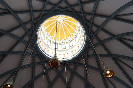 three beige pendant lights on ceiling thumbnail