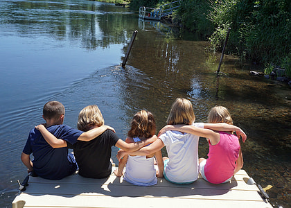 five childrens sits on dock thumbnail