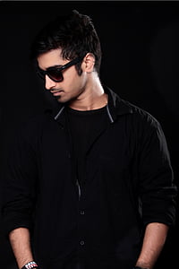 man facing right with black background thumbnail