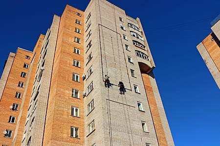two person sky crapping on building thumbnail
