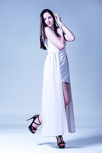 woman wearing white sleeveless dress thumbnail