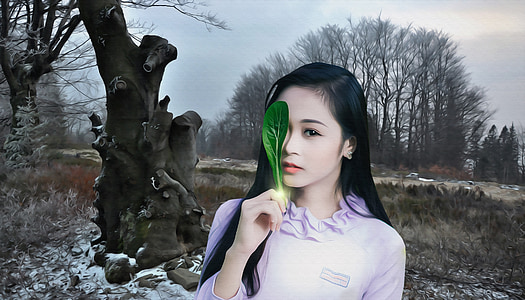 woman holding green leaf thumbnail