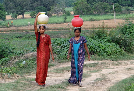 two women standing wearing jars thumbnail