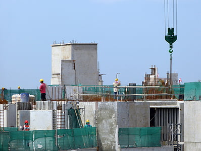 person standing on concrete building thumbnail