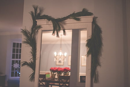 white framed mirror inside white painted room thumbnail