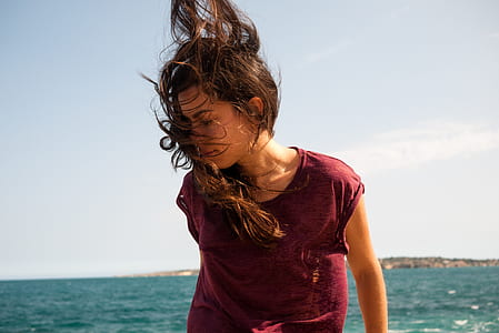 woman in maroon shirt thumbnail