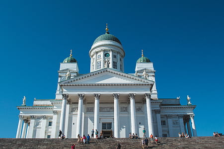 White Concrete Building Under Blue Sky thumbnail
