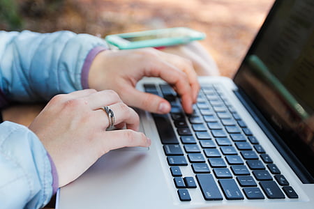 person using laptop computer thumbnail