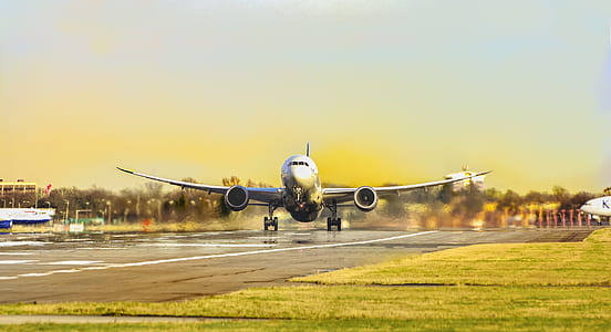 white airliner on airport thumbnail