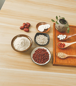 food photography of nuts on bowl and three serving spoons with  ingredients thumbnail
