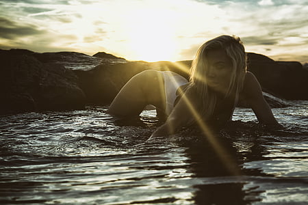 woman wearing white monokini thumbnail