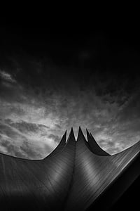 ant view of building under cloudy sky thumbnail