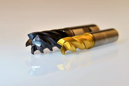 shallow focus photography of black and brown drill bits thumbnail
