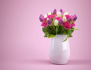 bouquet of purple, pink, and white petaled flowers in white ceramic vase thumbnail