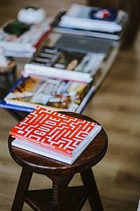 Laptop, a smartphone, magazines and cups of coffee on a table thumbnail