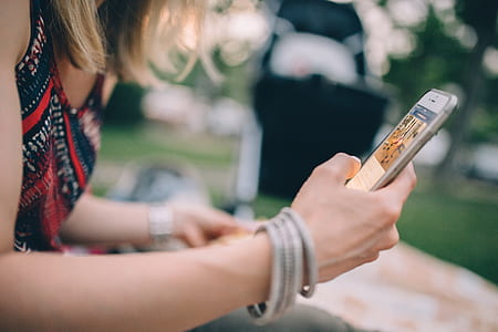 woman holding smartphone thumbnail
