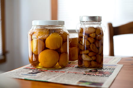 three clear glass jars on newspaper thumbnail