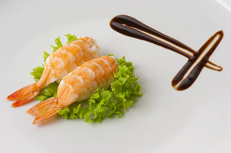 two cooked shrimp with lettuce on plate thumbnail