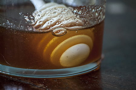 Closeup of dipper in honey thumbnail