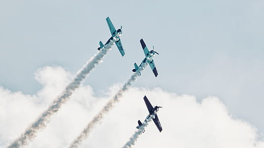 three white airplanes thumbnail