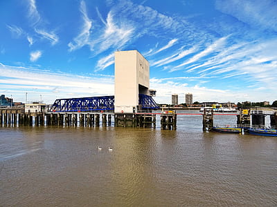 jetty, sea, city, sky thumbnail