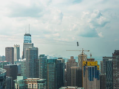landscape photography of commercial buildings during daytime thumbnail