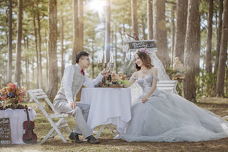 man and woman sitting on chairs thumbnail