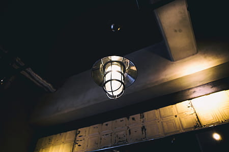 low-angle photo of gray pendant lamp beside white wall thumbnail
