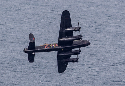 black KCOA plane in flight thumbnail