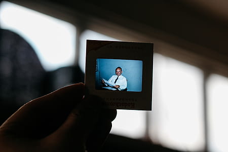 person viewing the image of man thumbnail