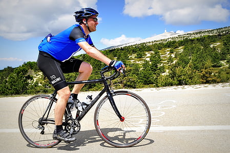 person riding bicycle at daytime thumbnail