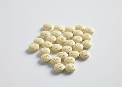 round beige medicine tablets thumbnail