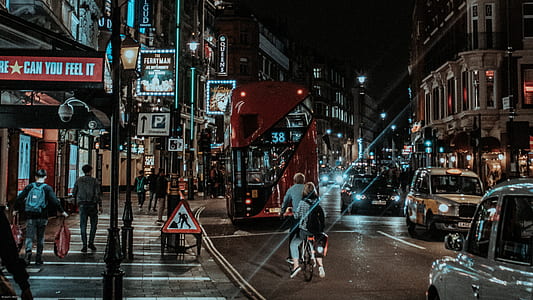 people and cars io street at night thumbnail