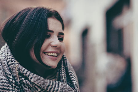 closeup photo of woman wearing grey scarf thumbnail