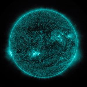green planet against black background thumbnail
