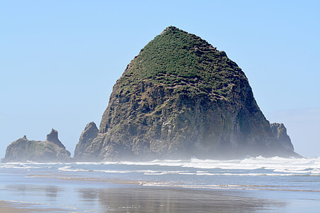 Giant Rock Coming out of the sea at Cannon Beach, Oregon thumbnail