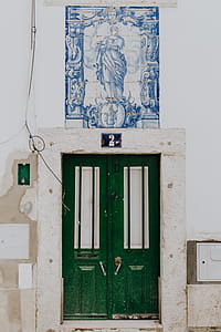 Colorful wooden door in the facade of a typical Portuguese house at Lisbon, Portugal thumbnail