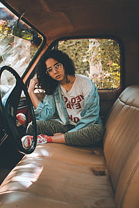 woman sitting inside car thumbnail
