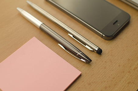 two twist pens on table thumbnail