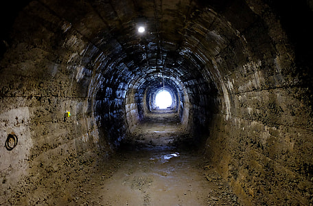 concrete tunnel with light bulbs thumbnail